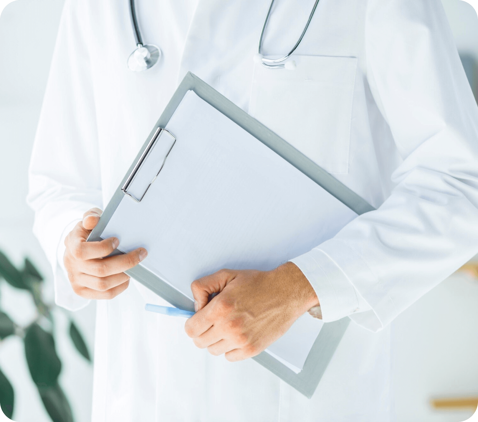 A provider, equipped with a clipboard and pen, is poised to record vital information during a patient consultation.
